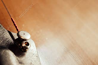 Strings and tailpiece on a Gypsy acoustic guitar