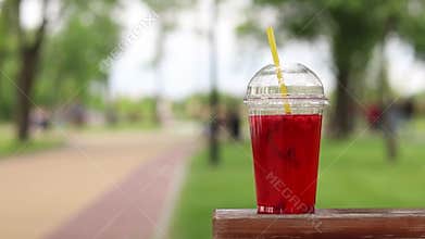Lemonade in a disposable plastic cup, takeaway drink