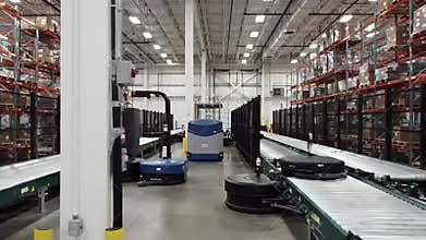 Automated Luggage Handling Conveyor Belt System in Bright Warehouse