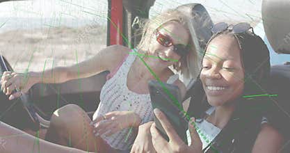 Travel influencers scrolling smartphone in red convertible at beach, showing animated social icons