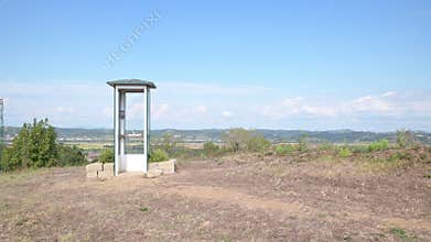 An isolated telephone booth in the countryside of Santo Pietro Belvedere, Capannoli, Italy