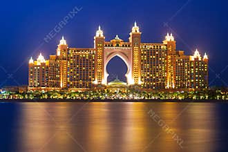 Atlantis hotel iluminated at night in Dubai