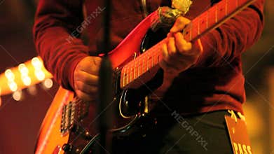 Musician plays the guitar