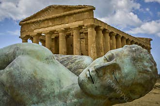 Fallen ikaro in front of concorde temple sicily