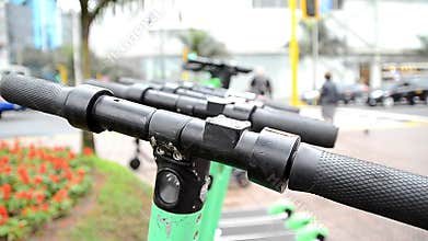 Electric scooters in a parking lot in the city of Lima - Peru. Electric scooters are rented to tourists and residents of the city.
