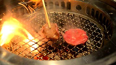 Slice ox tongue on hot charcoal grill pan