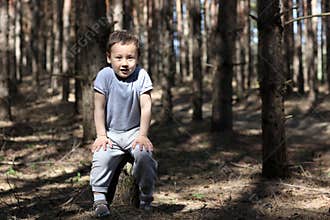 One boy in forest