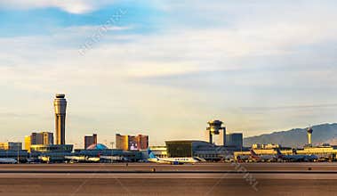 McCarran Airport with airplanes and Las Vegas Cityscape in the background