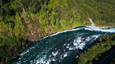 Drone View of River Rapids with Lush Green Forest