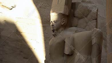 Egyptian statue pharaoh carved and rocks