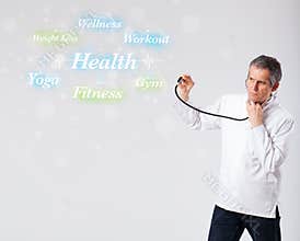 Clinical doctor pointing to health and fitness collection of words
