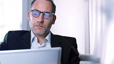 Businessman working with tablet PC