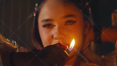 Contemplative Woman with Lighter Flame
