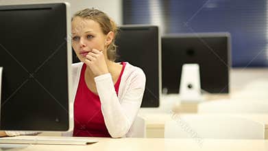Young female student in a computer classroom