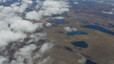 Flying above the clouds and lakes