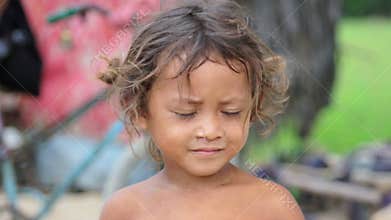 Cambodian kids in slums near phnom penh city dumping area