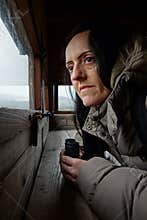 Birdwatching, a woman with binoculars