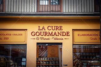 Front of La Cure Gourmande sweet shop in Valenciaâ€™s El Mercat quarter. la Cure Gourmande is