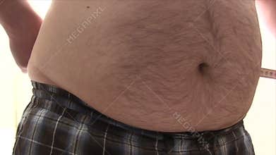 Measuring His Thick Belly