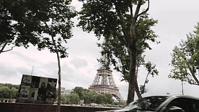 Paris, France , the car drives past the Eiffel Tower