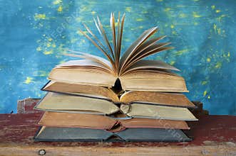 Stack of open books