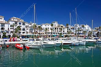 Boats and yachts moored in Duquesa port in Spain on the Costa de
