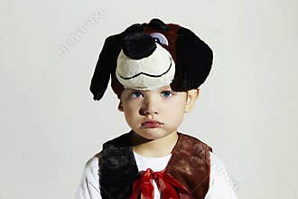 Sad little Boy in Carnival Dog Costume.Kids.Masquerade.Child