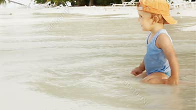 Little boy on the ocean beach