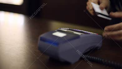 Credit card payment terminal in store. Close up.