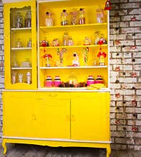 Colorful bright yellow welsh dresser