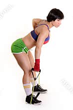 Fit woman on a white background with exercise band