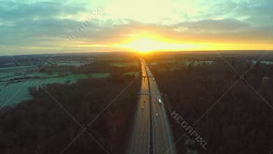 Aerial view of a truck and other traffic driving along a road