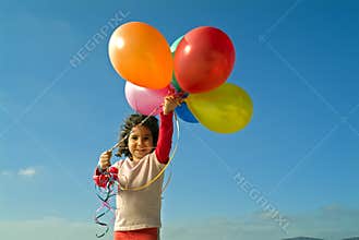 Girl and baloons