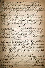 vintage handwriting. page of old poetry book. aged paper background