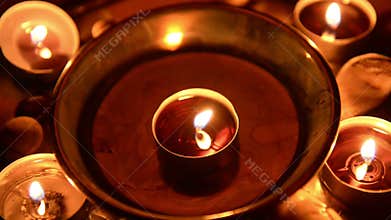 Candles burning at altar