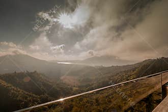 Dramatic Mountain Panorama With Sun Rays Over Tropical Valley