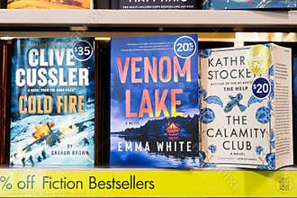 Toronto, Canada - June 18, 2026: Fiction bestsellers display with Cold Fire, Venom Lake, and The Calamity Club