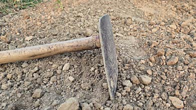 Sharp Agriculture Hoe Tool On Loose Soil In Bangladesh