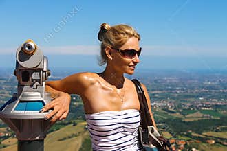Attractive girl on the observation deck fortresses of San Marino