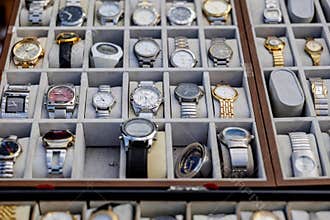 Vintage wristwatches displaying in velvet lined jewelry box