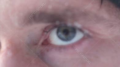 Blur man Eye with snowflake closeup