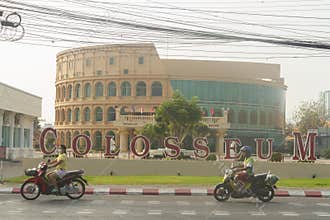 The Roman-style Colosseum Show theatre building under a hazy sky
