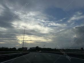 Driving on A10 Ring Road at Golden Hour Through Amsterdam Zuidas Business