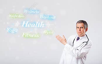 Clinical doctor pointing to health and fitness collection of words