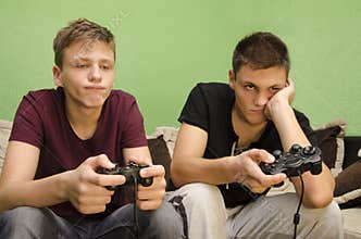 Brothers playing video games boredom