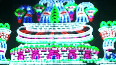 Blurred Colorful LED Festival Gate Lights at Night, Defocused Bokeh Pandal Entrance Decoration India