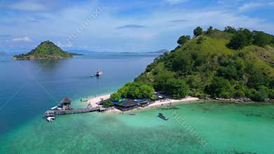 Komodo island paradise beach, jetty, turquoise ocean. Magic aerial view drone