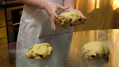 process of baking Easter bread with raisins soaked in cognac. homemade holiday pastries. Festive yeast dough, cozy home