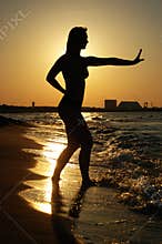 Sunset Tai Chi on a beach