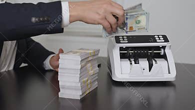 Male hand counting dollars. Business finance management in office. Banker counting cash closeup. Financial planning. Financial